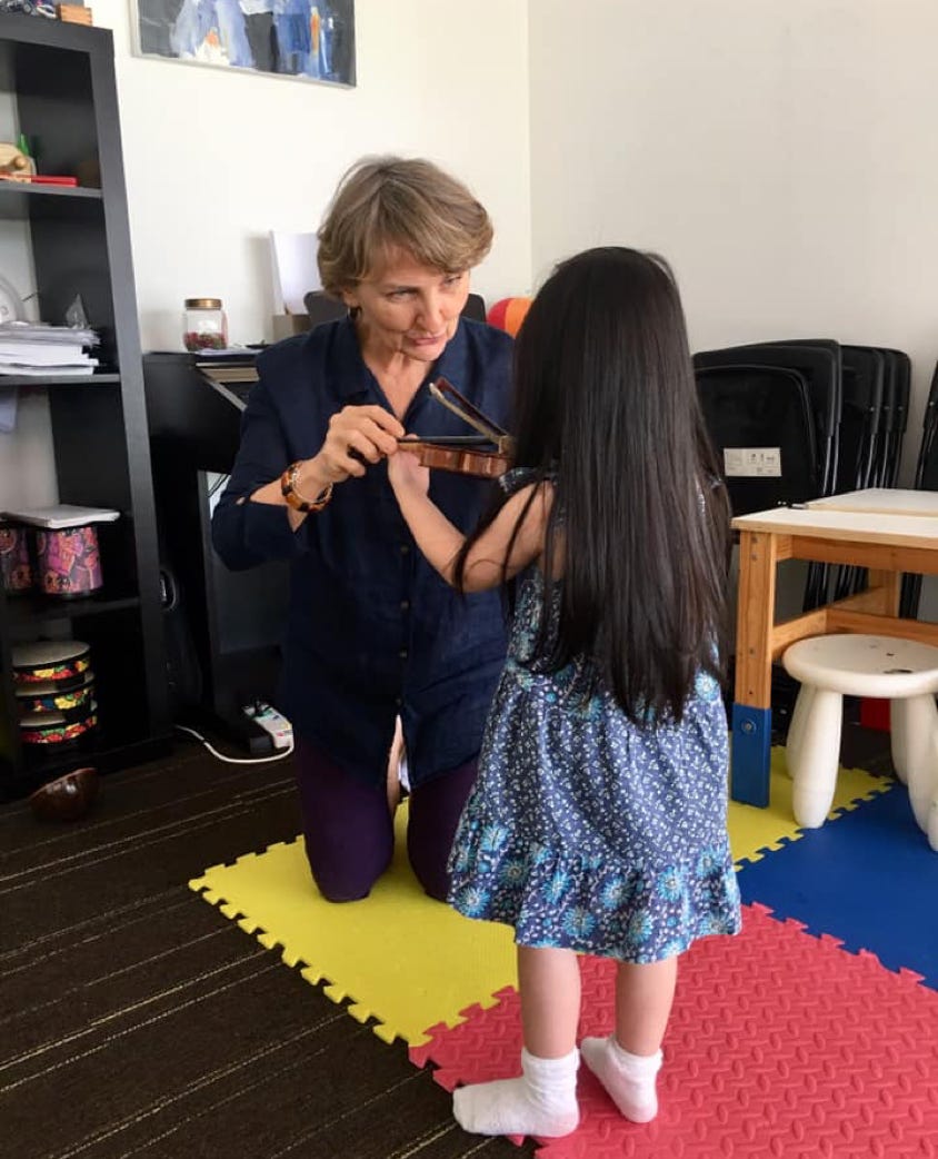 Violin teacher and 2yo daughter.